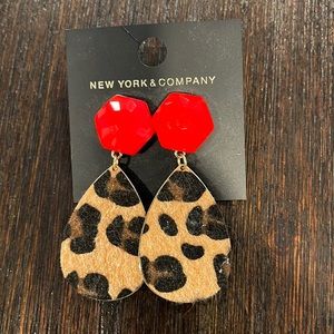 Cheetah earrings never worn bought online.